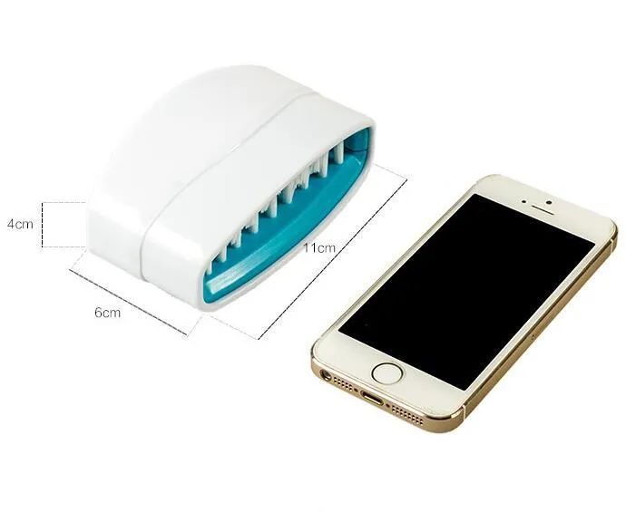 Blue kitchen cleaning brush with suction cup showing knife and fork design for washing fruits and vegetables