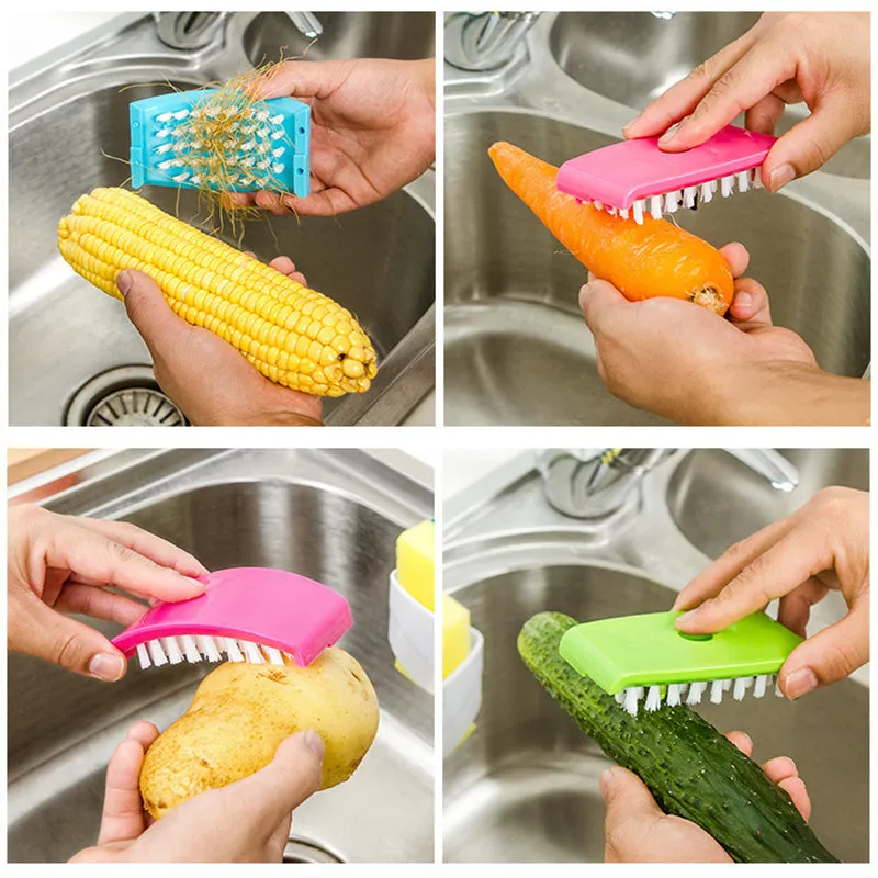 Blue kitchen cleaning brush with suction cup showing knife and fork design for washing fruits and vegetables