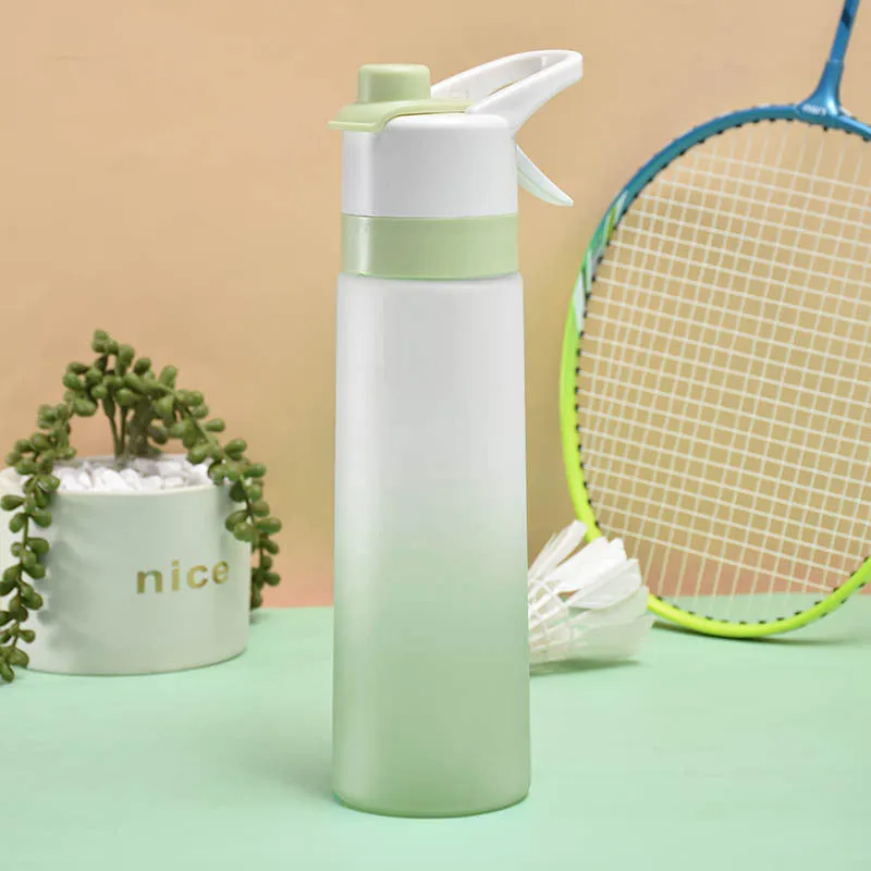 White 700ml plastic spray water bottle with handle strap and leakproof lid.