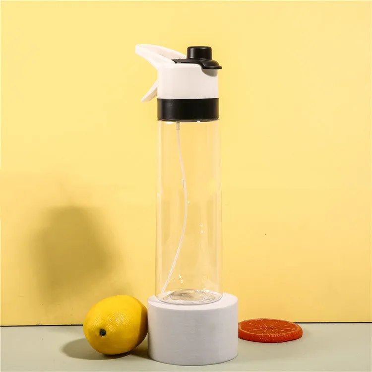 White 700ml plastic spray water bottle with handle strap and leakproof lid.