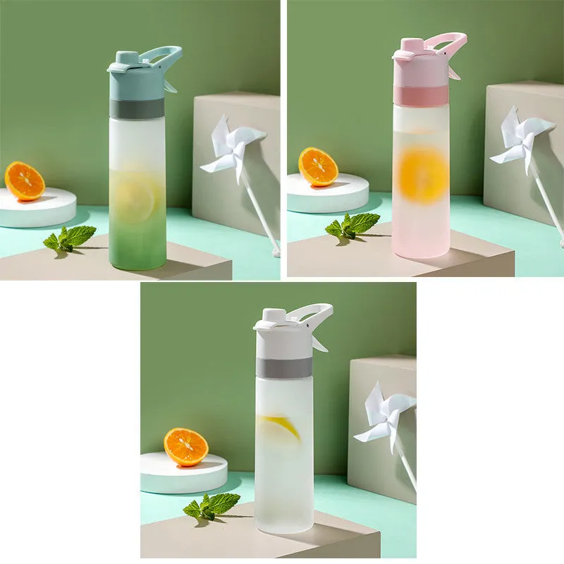 White 700ml plastic spray water bottle with handle strap and leakproof lid.