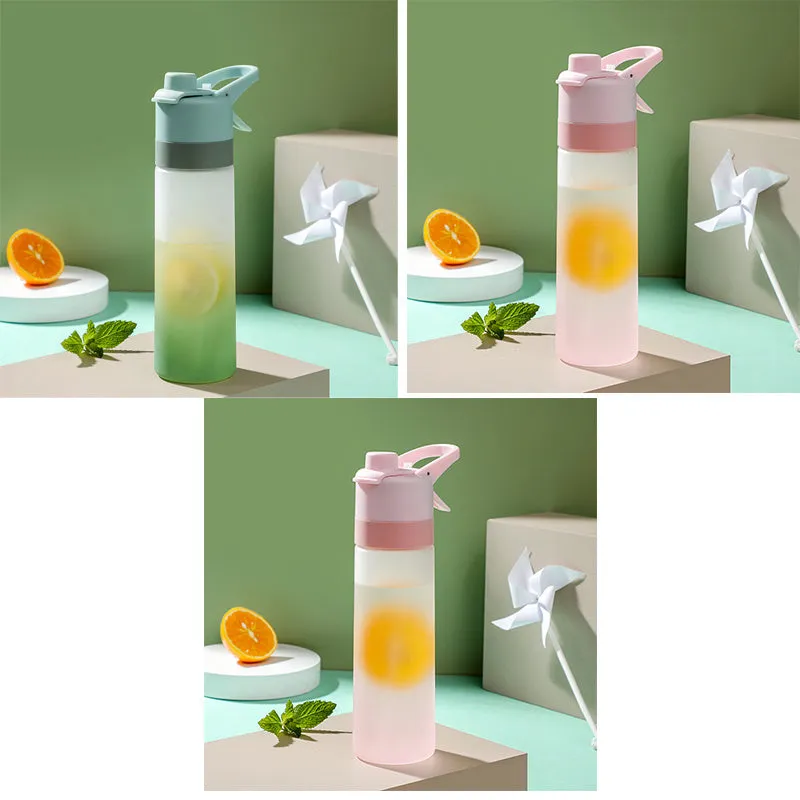 White 700ml plastic spray water bottle with handle strap and leakproof lid.