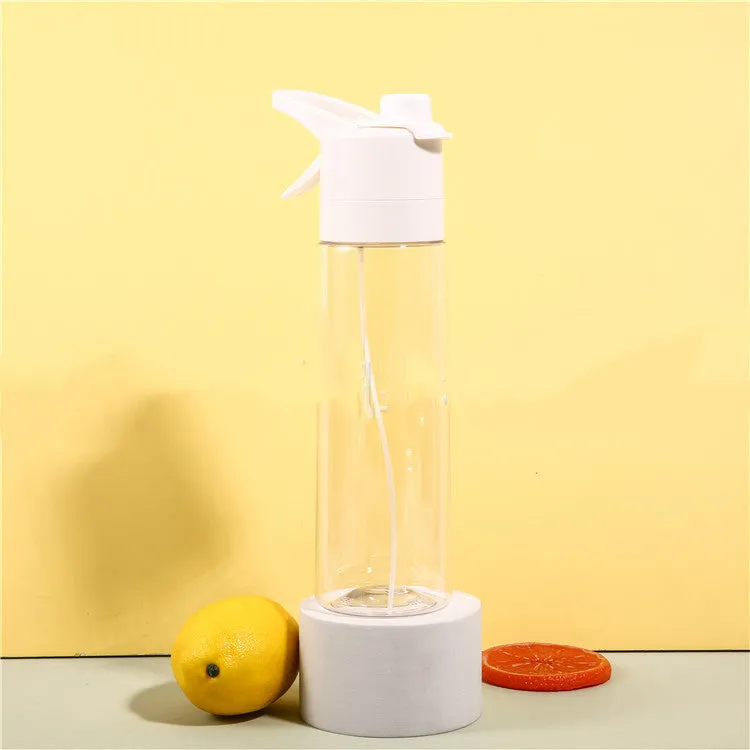 White 700ml plastic spray water bottle with handle strap and leakproof lid.