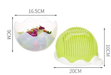 Blue salad cutter bowl with chopping lid and serving plate base on a kitchen counter