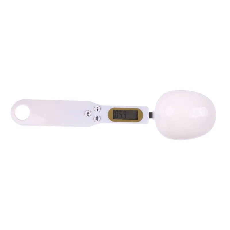 White digital spoon scale with LCD display showing weight measurement for kitchen use
