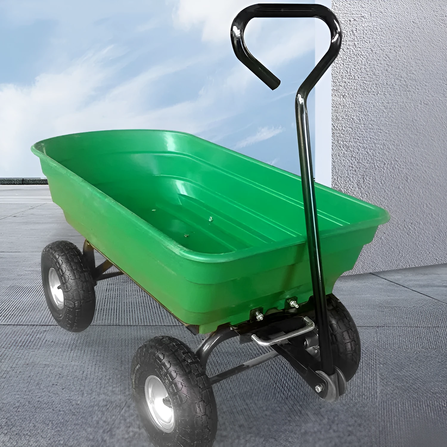 Green four-wheel plastic toy dump truck model TC2145 on a white background.