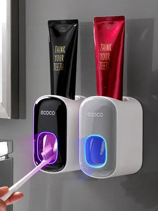 Wall mounted automatic toothpaste dispenser and toothbrush holder set with suction cup mounting