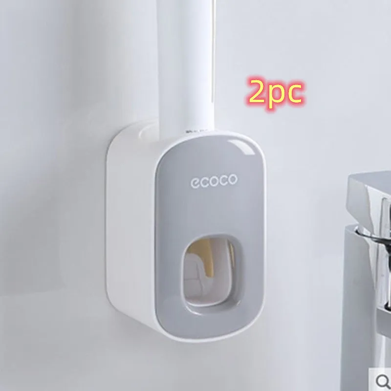 Wall mounted automatic toothpaste dispenser and toothbrush holder set with suction cup mounting