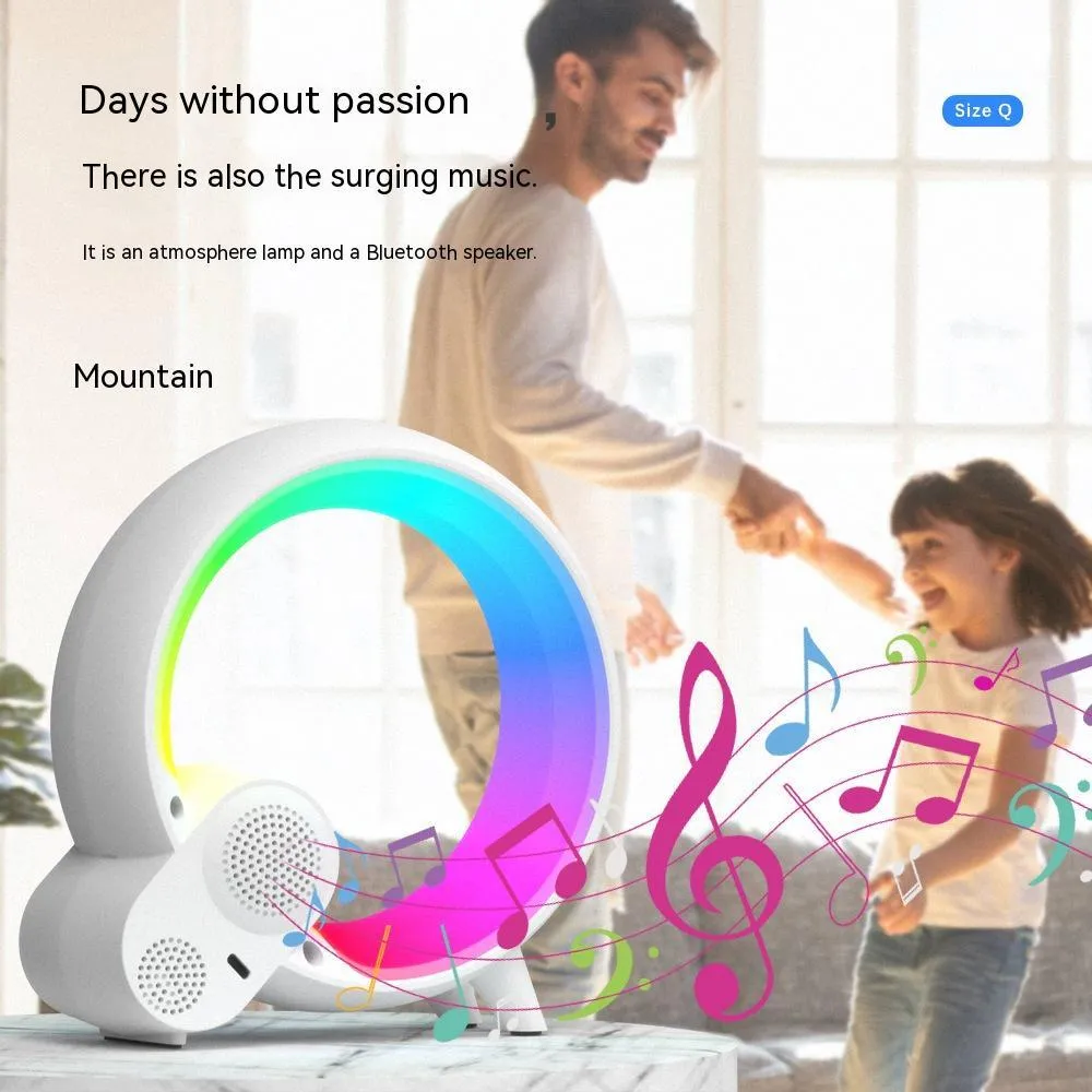 Creative Q modern digital alarm clock with colourful LED light ring in black or white finish.