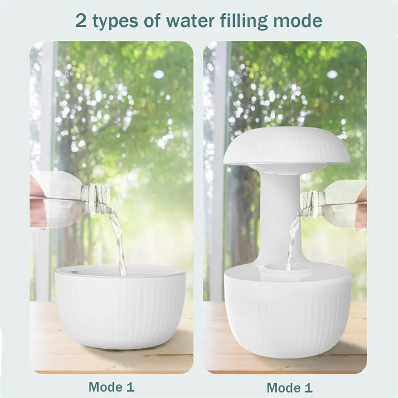 White anti-gravity humidifier showing water droplets levitating upwards from its mist outlet.