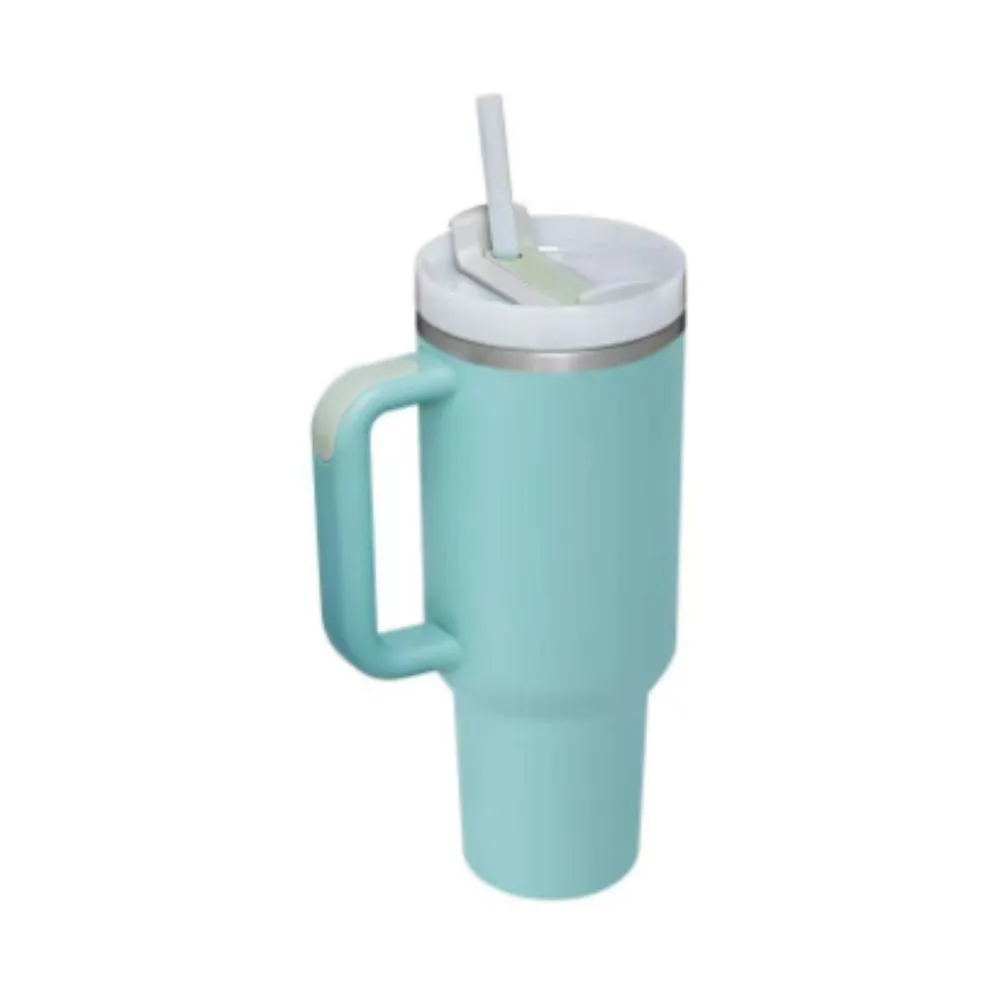 40 oz stainless steel insulated tumbler with a black handle, straw, and grey lid on a wooden table