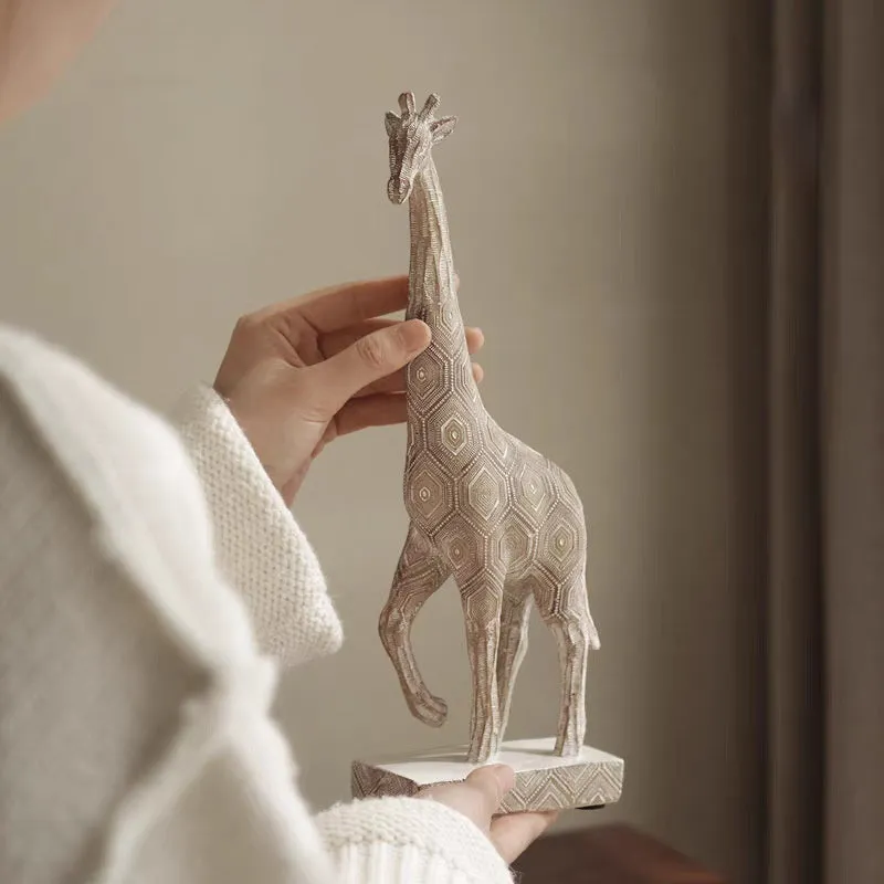 Wood colour European-style giraffe resin ornament on a shelf.