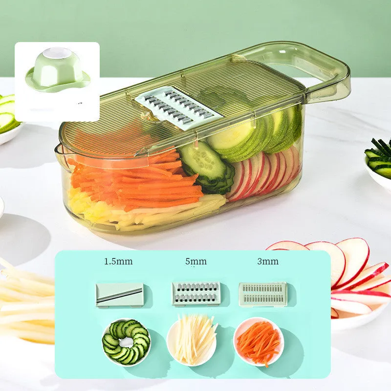 Transparent green vegetable cutter with stainless steel blades and 1.5L capacity container