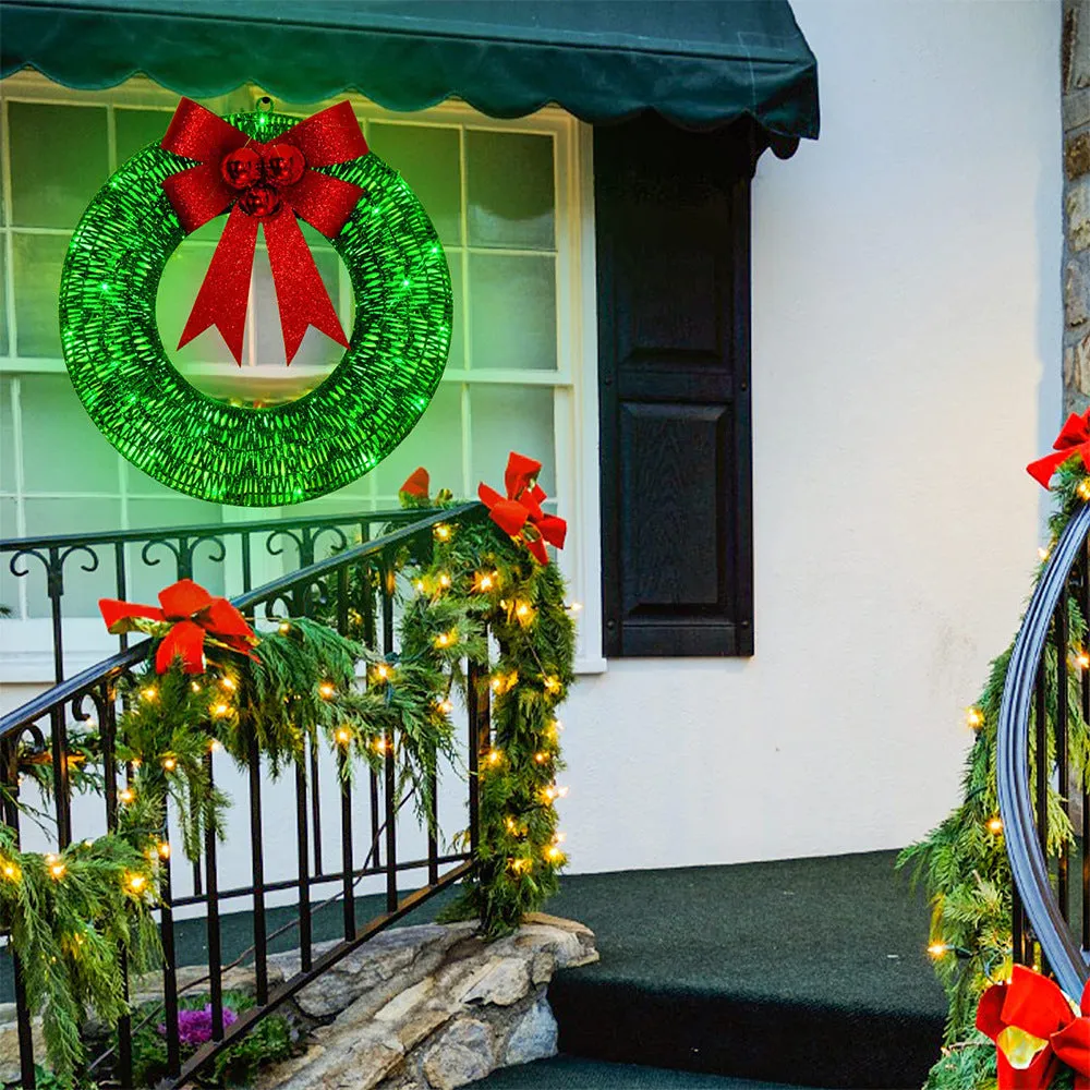 50cm gold and green Christmas garland with LED lights and bowknot on a door