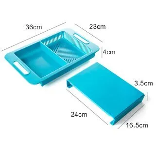 Blue kitchen chopping board with built-in sink drain basket and TPE handle on a counter.