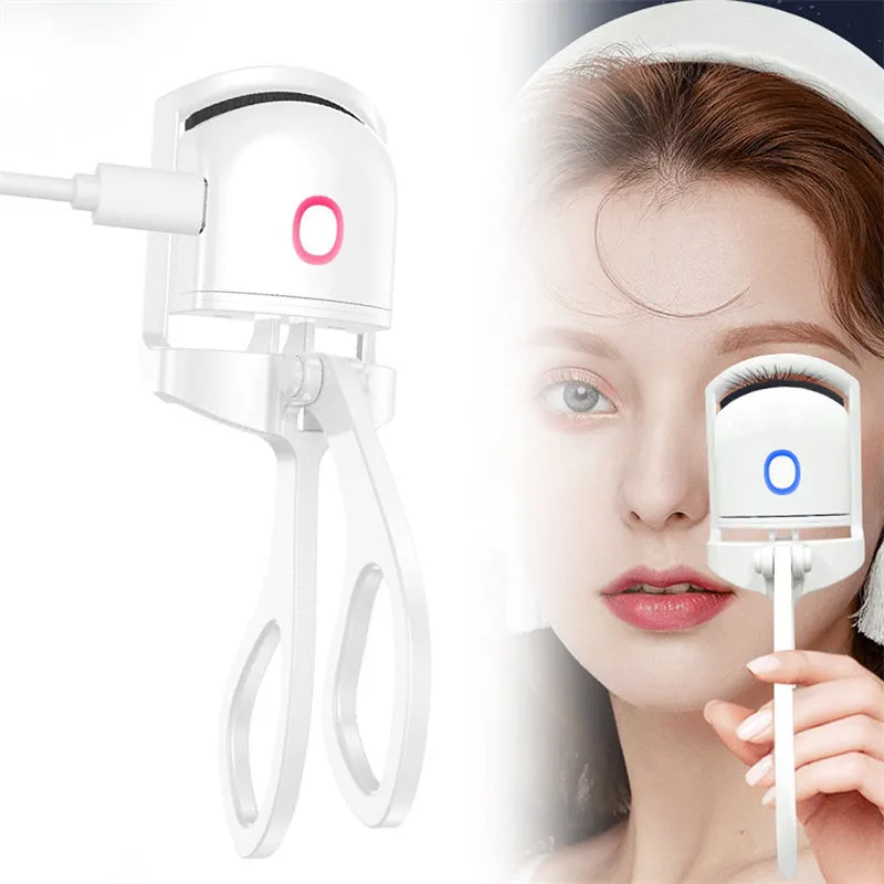 White and pink USB rechargeable heated eyelash curler with curved silicone pad.