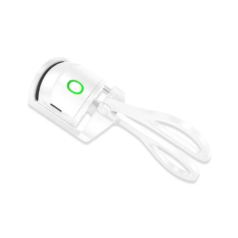 White and pink USB rechargeable heated eyelash curler with curved silicone pad.
