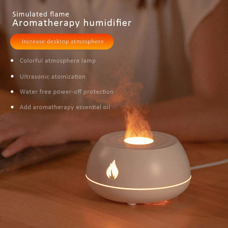 Black flame humidifier aroma diffuser with 130ml tank, 7 colour lights, and USB power on a wooden table