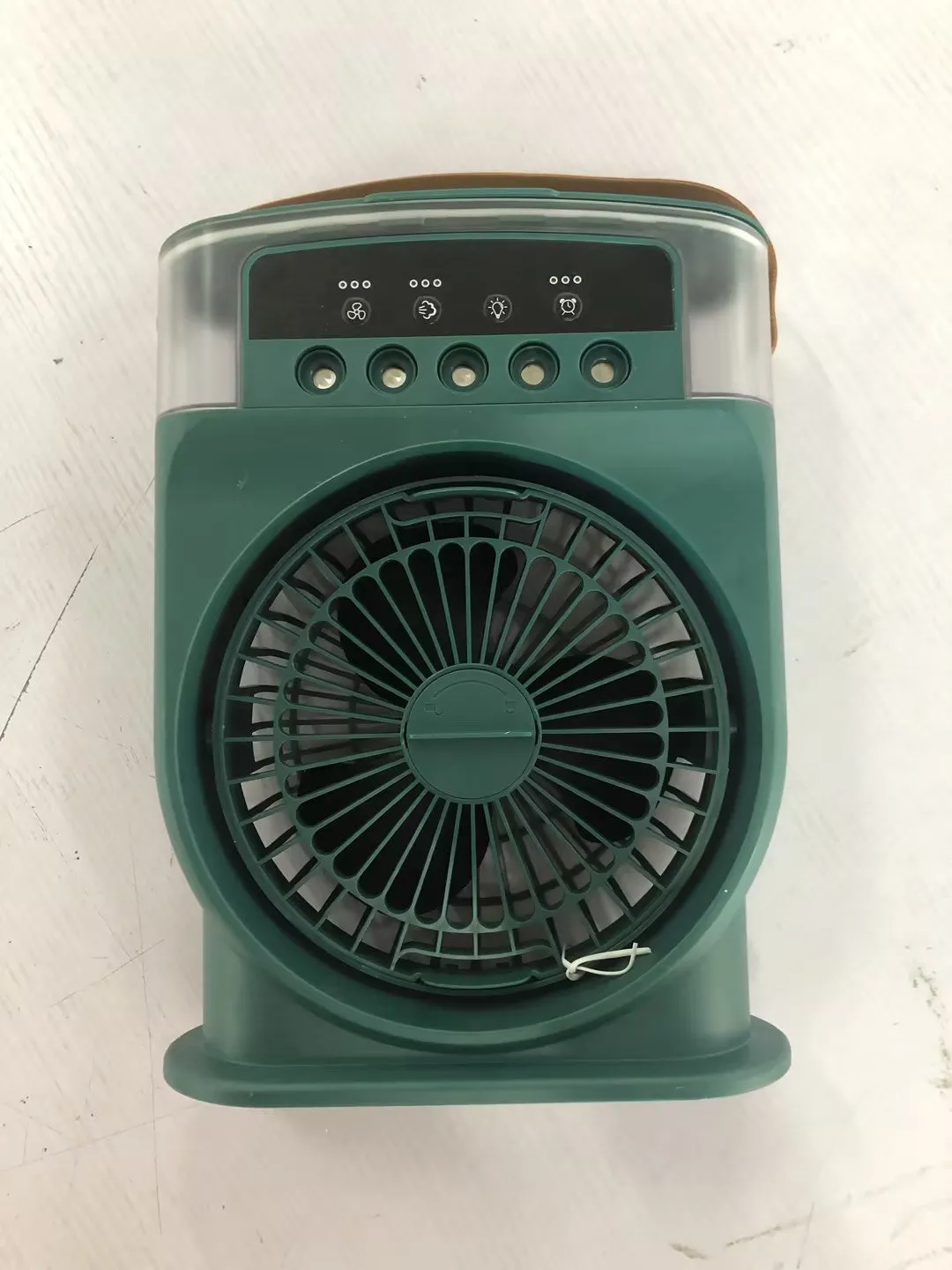 Portable USB air conditioner cooling fan with 5 spray mist outlet, 600ml water tank, 7 colour LED lights, and leather handle in white