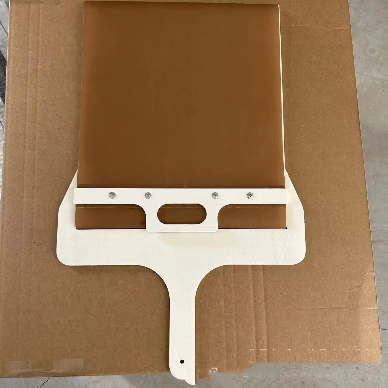 Natural wood sliding pizza peel in log colour with wooden handle, available in three sizes for transferring baked goods
