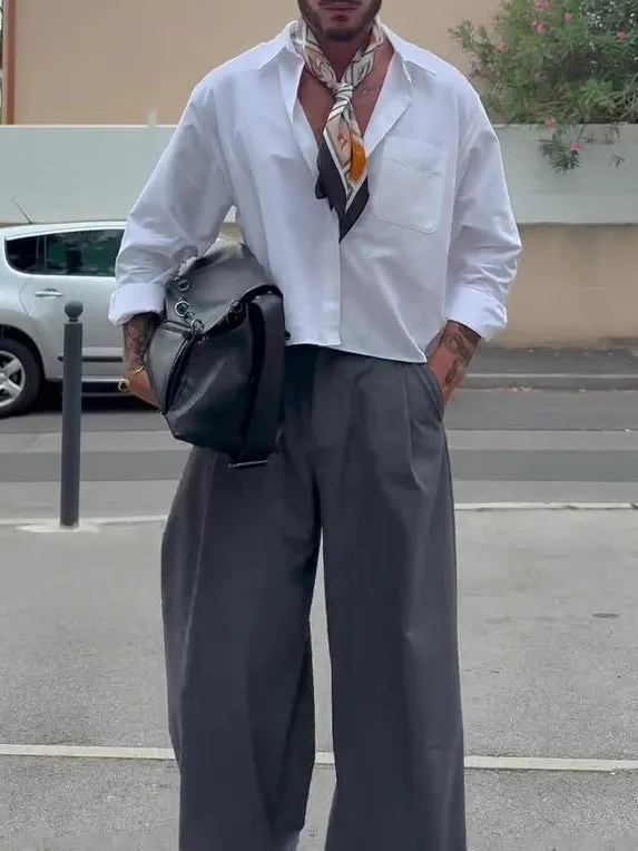 Grey men's high-waisted wide-leg casual trousers on a hanger.