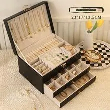 Leather jewellery storage box with three drawers in choice of colours.