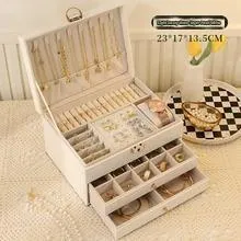Leather jewellery storage box with three drawers in choice of colours.