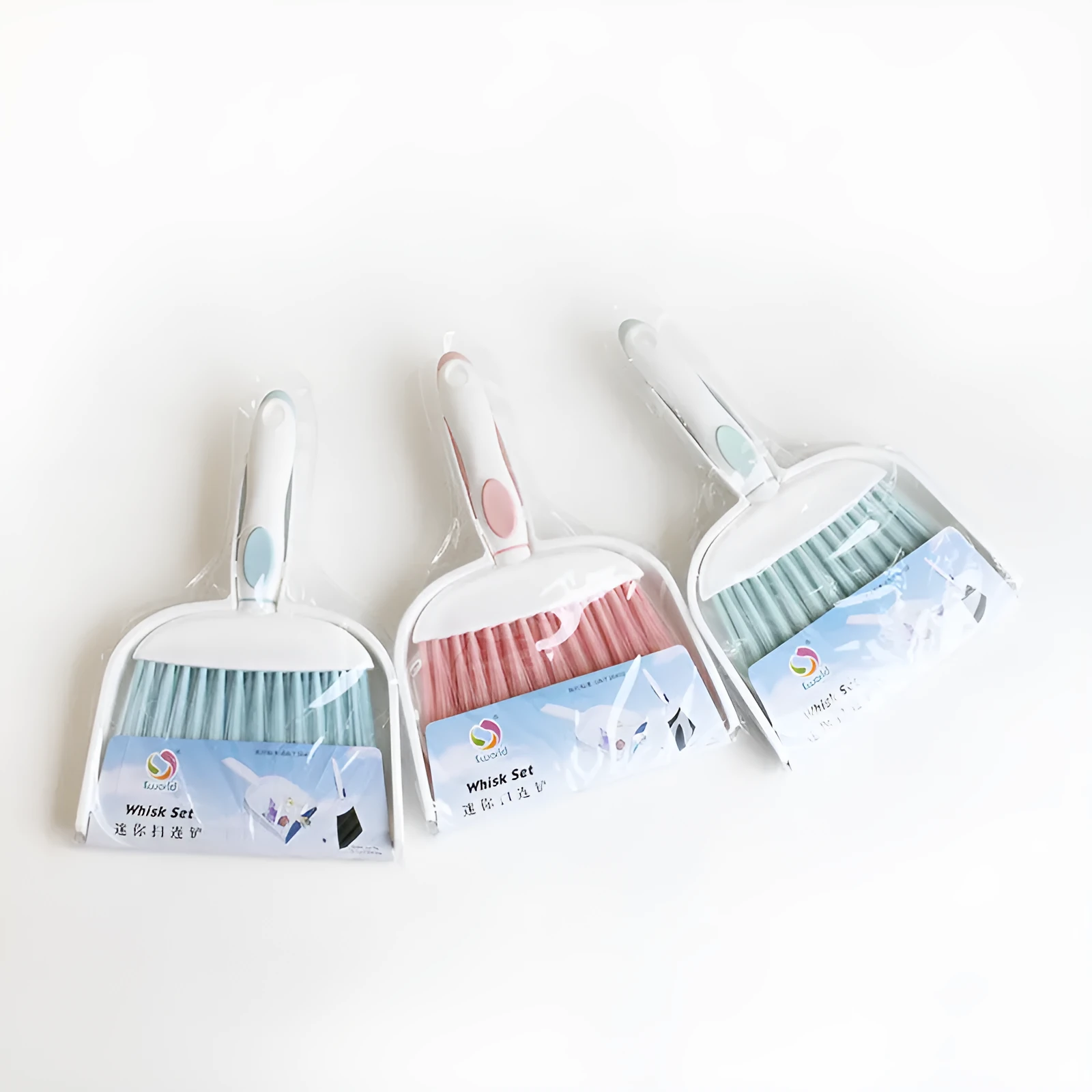 Mini plastic dusting brush and dustpan suit in small size with colour options cherry blossom powder, glacier blue, Nordic green, gray, blue white, and green white