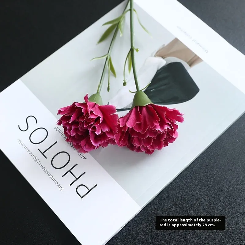 Artificial carnation flower with silk petals on soft rubber base in four colour options
