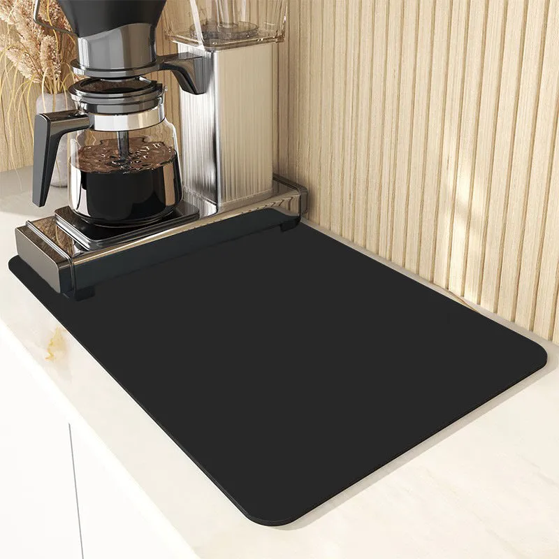 Square 60x90 cm rubber kitchen draining pad in blue checked pattern on countertop