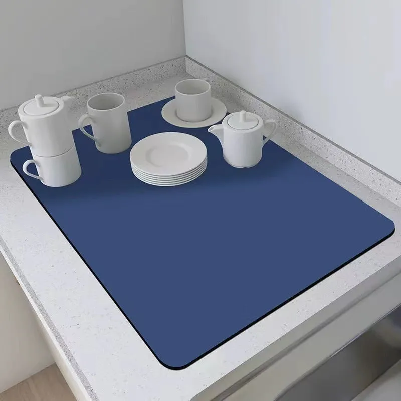 Square 60x90 cm rubber kitchen draining pad in blue checked pattern on countertop