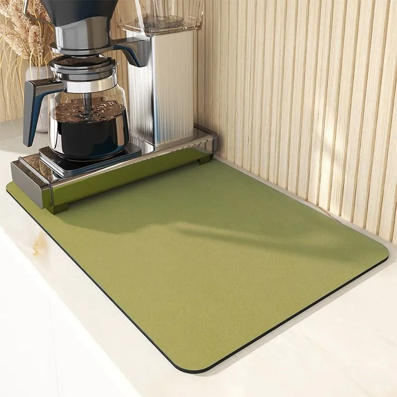 Square 60x90 cm rubber kitchen draining pad in blue checked pattern on countertop
