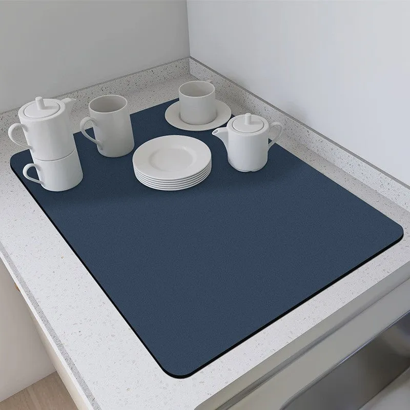 Square 60x90 cm rubber kitchen draining pad in blue checked pattern on countertop