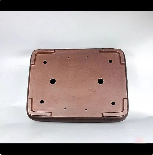 Handmade rectangular purple clay flower pot with antique finish showing internal planting space
