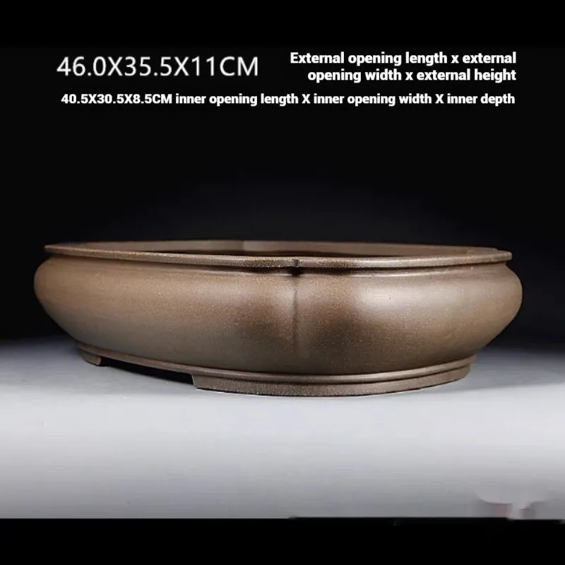 Handmade antique papaya-shaped purple clay flower pot, 46cm long.