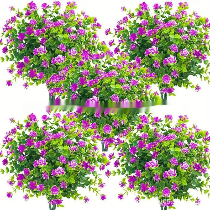Artificial eucalyptus camellia plastic bouquet in mixed colours on white background