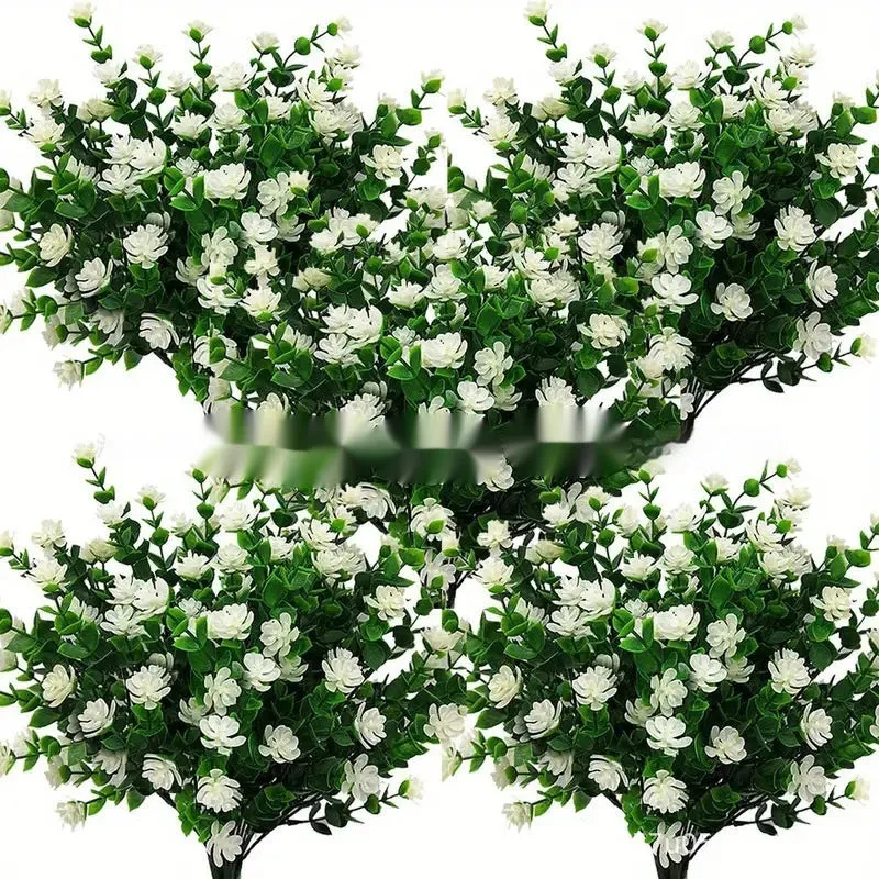 Artificial eucalyptus camellia plastic bouquet in mixed colours on white background