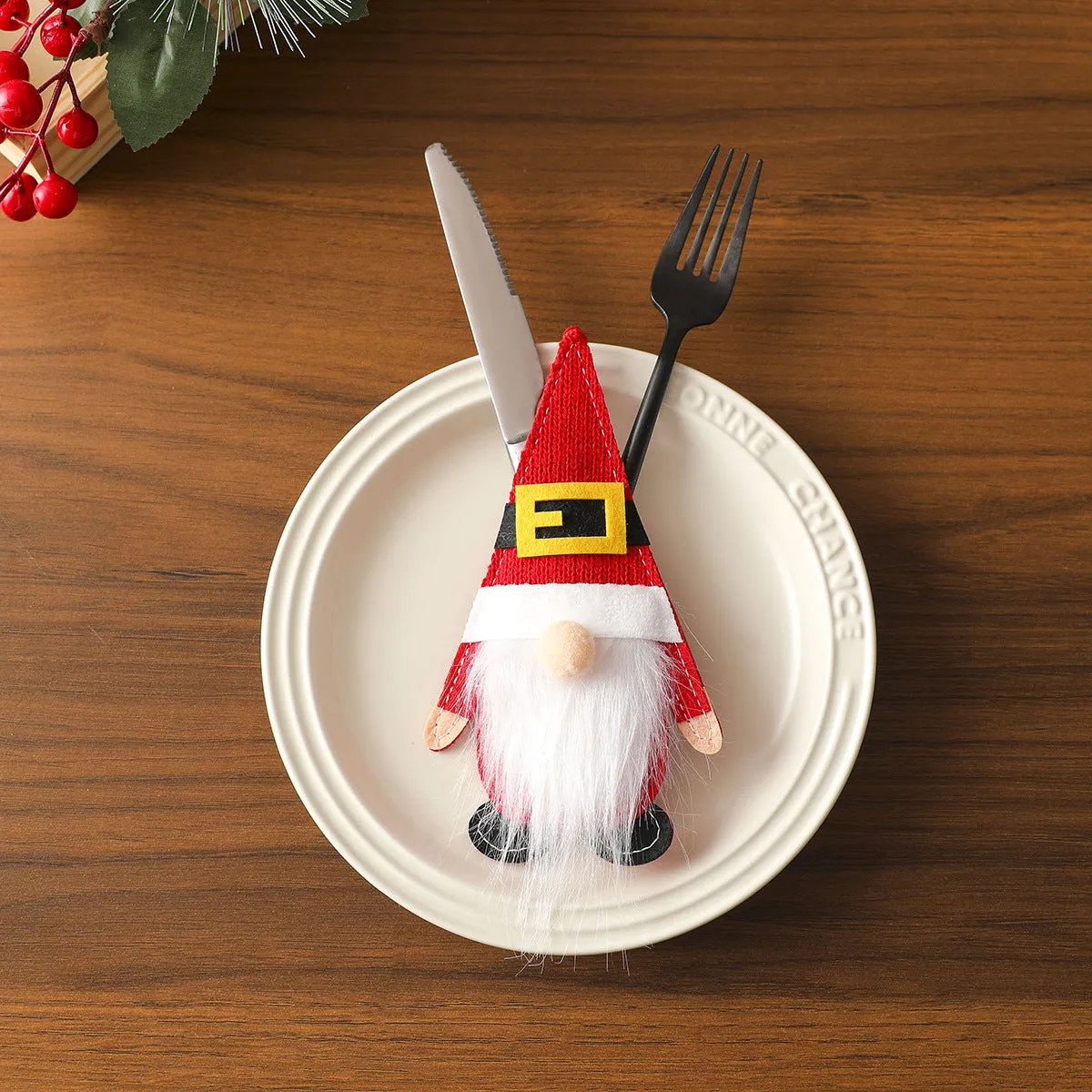 Christmas knife and fork cloth cover in snowflake style on a dining table