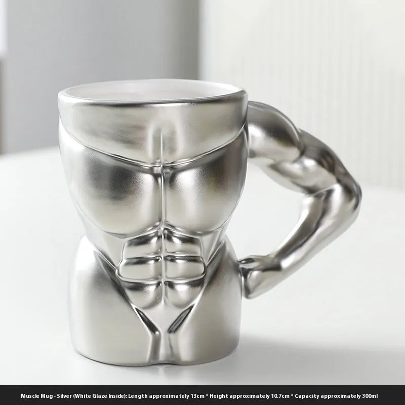Matte black ceramic mug with muscle man design and 300ml capacity.