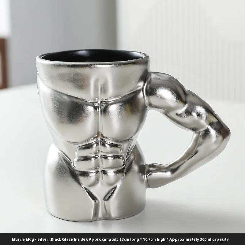 Matte black ceramic mug with muscle man design and 300ml capacity.