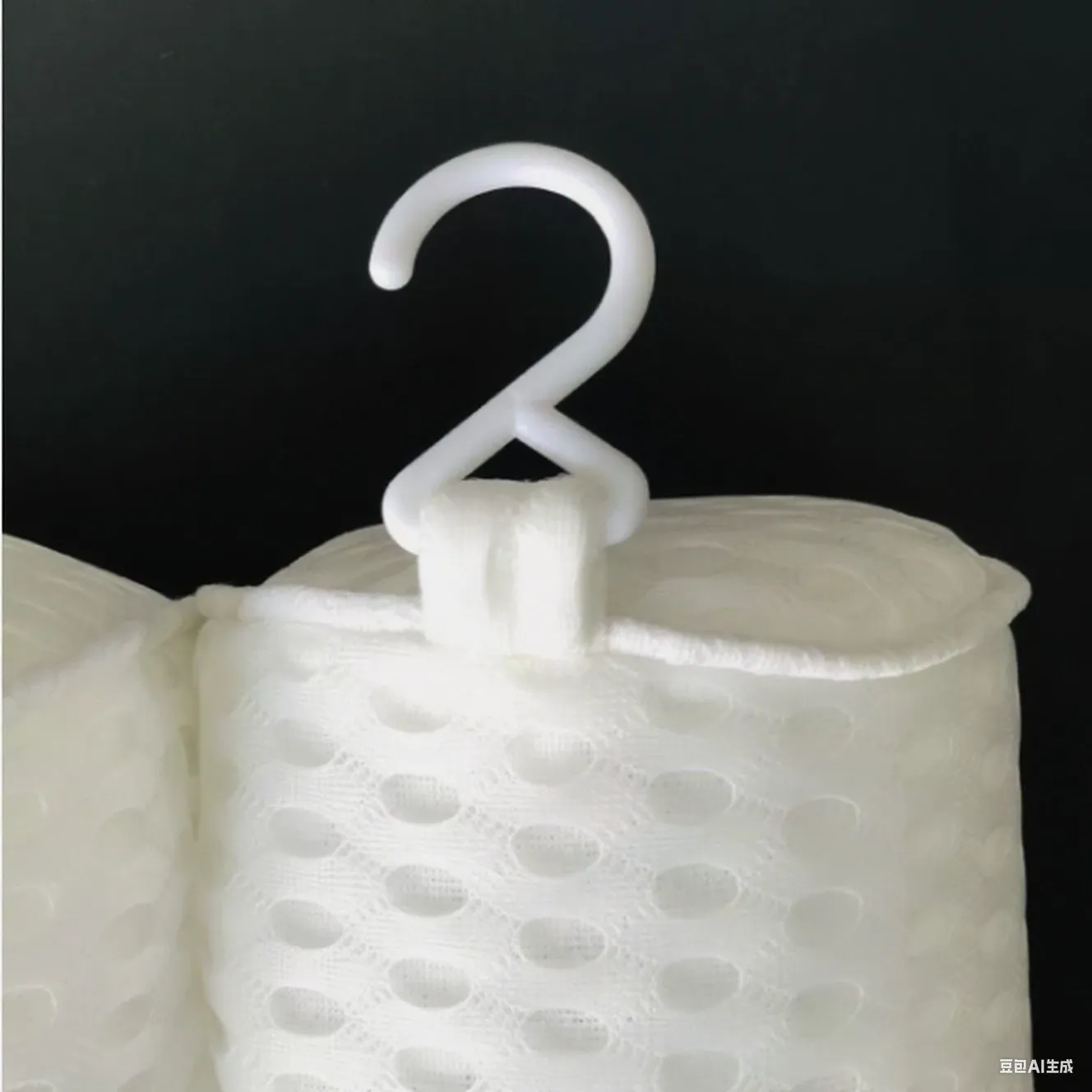 White bathtub pillow with 4D mesh and 7 suction cups on a bathtub.
