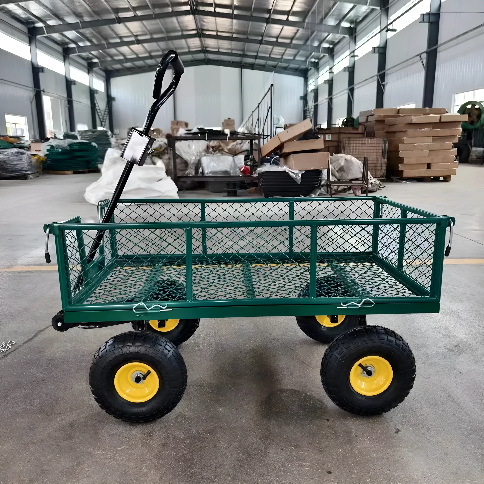 Green four-wheel hand push net car with iron frame and rubber terrain wheels