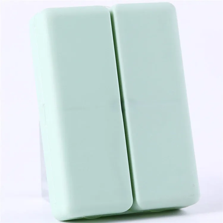 Four-color magnet 7-grid pill box in solid blue colour showing foldable covered design with seven compartments