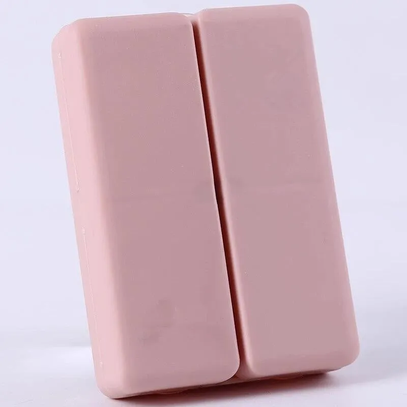 Four-color magnet 7-grid pill box in solid blue colour showing foldable covered design with seven compartments