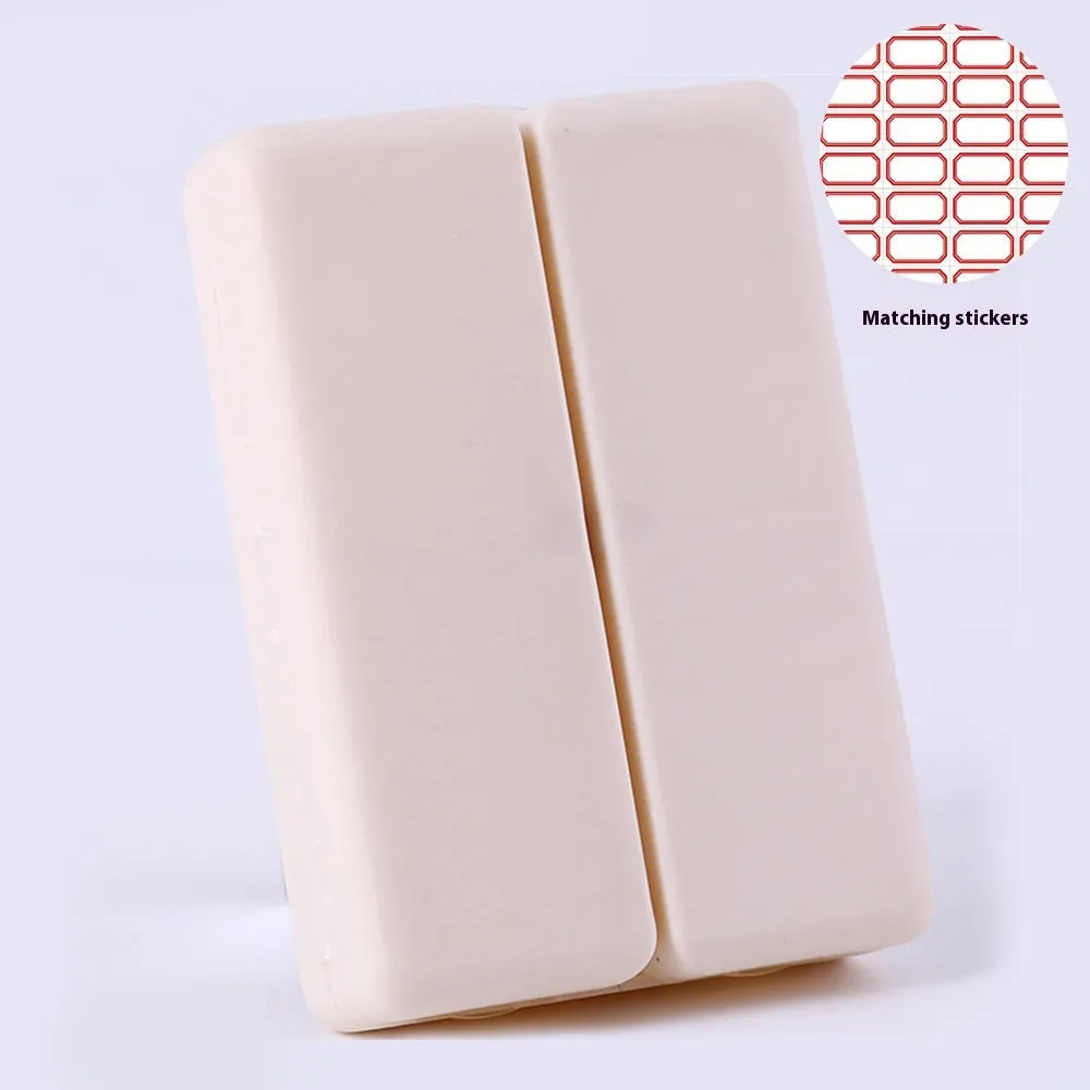 Four-color magnet 7-grid pill box in solid blue colour showing foldable covered design with seven compartments