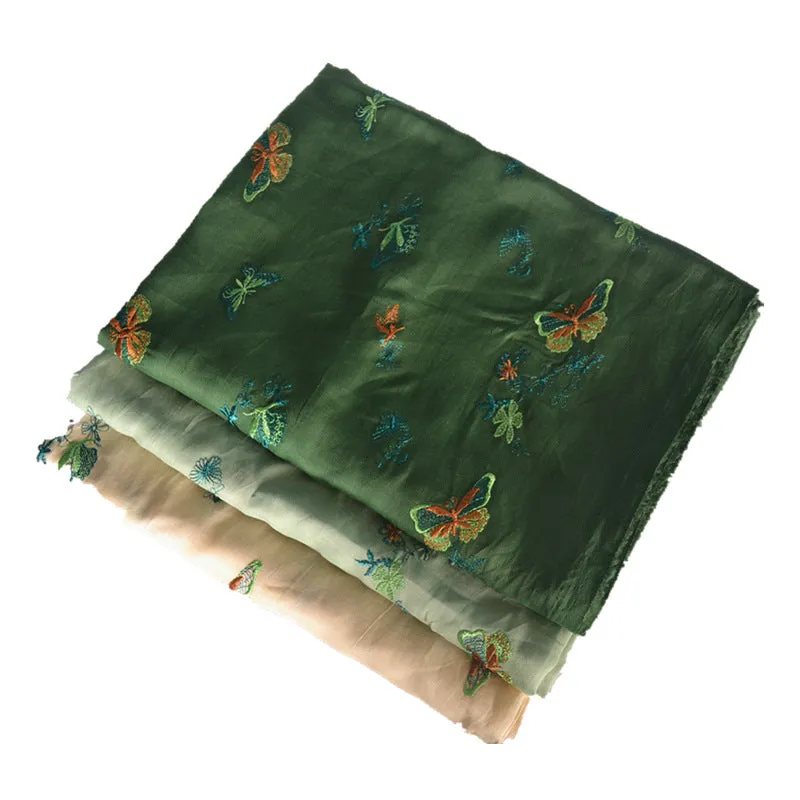 A piece of pure ramie fabric in a choice of beige, grass green, or dark green, shown with a ruler indicating its 140cm width.