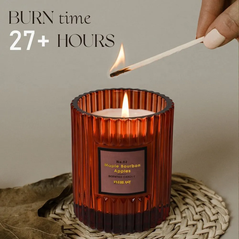 Cylindrical soy wax aromatherapy candle in amber colour with smooth surface