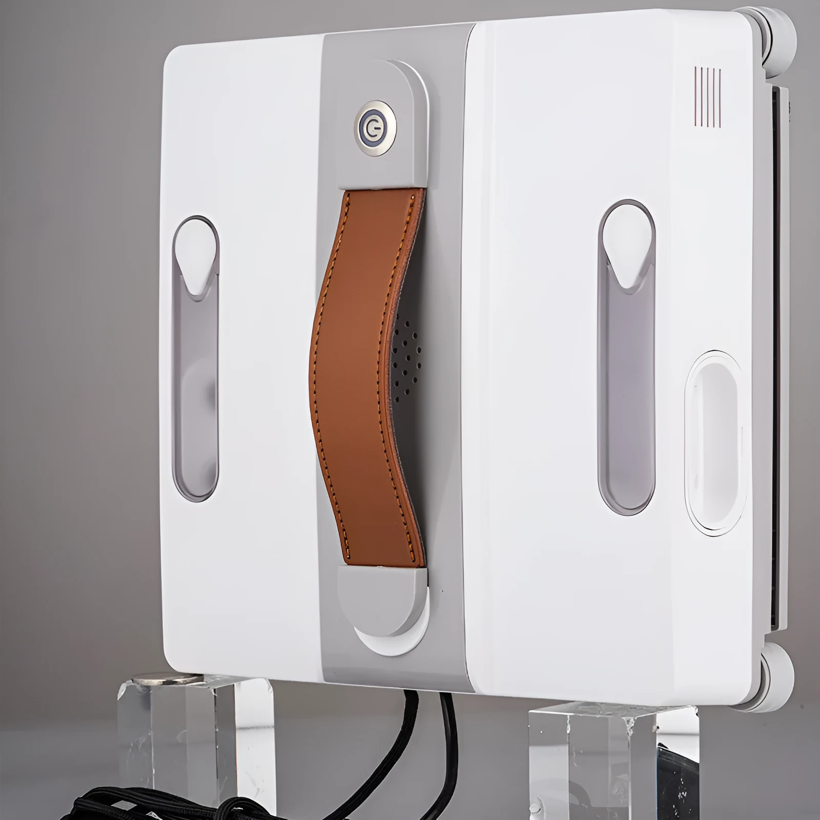 White square intelligent window cleaning robot for high-rise windows, showing control panel.
