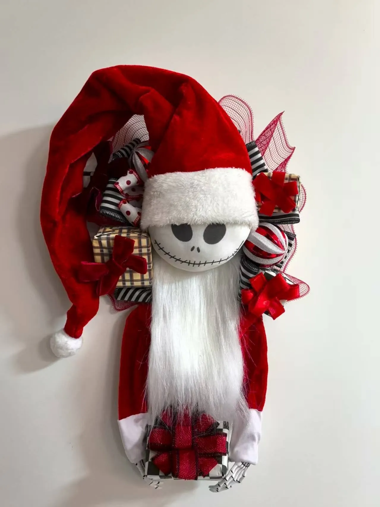 Three-dimensional Jack doll Christmas garland with wood and fabric construction for window displays