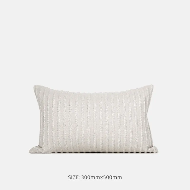 Black and white geometric patterned square and waist living room cushions with towel embroidery.